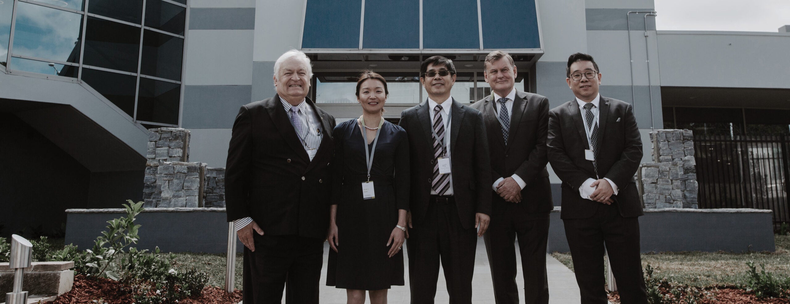 Dr Nature and Health Sharing Group team outside the manufacturing facility